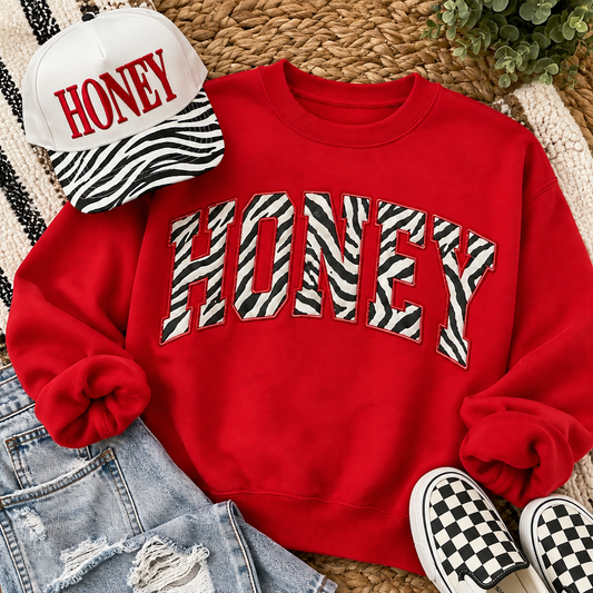 Honey zebra appliqué crewneck